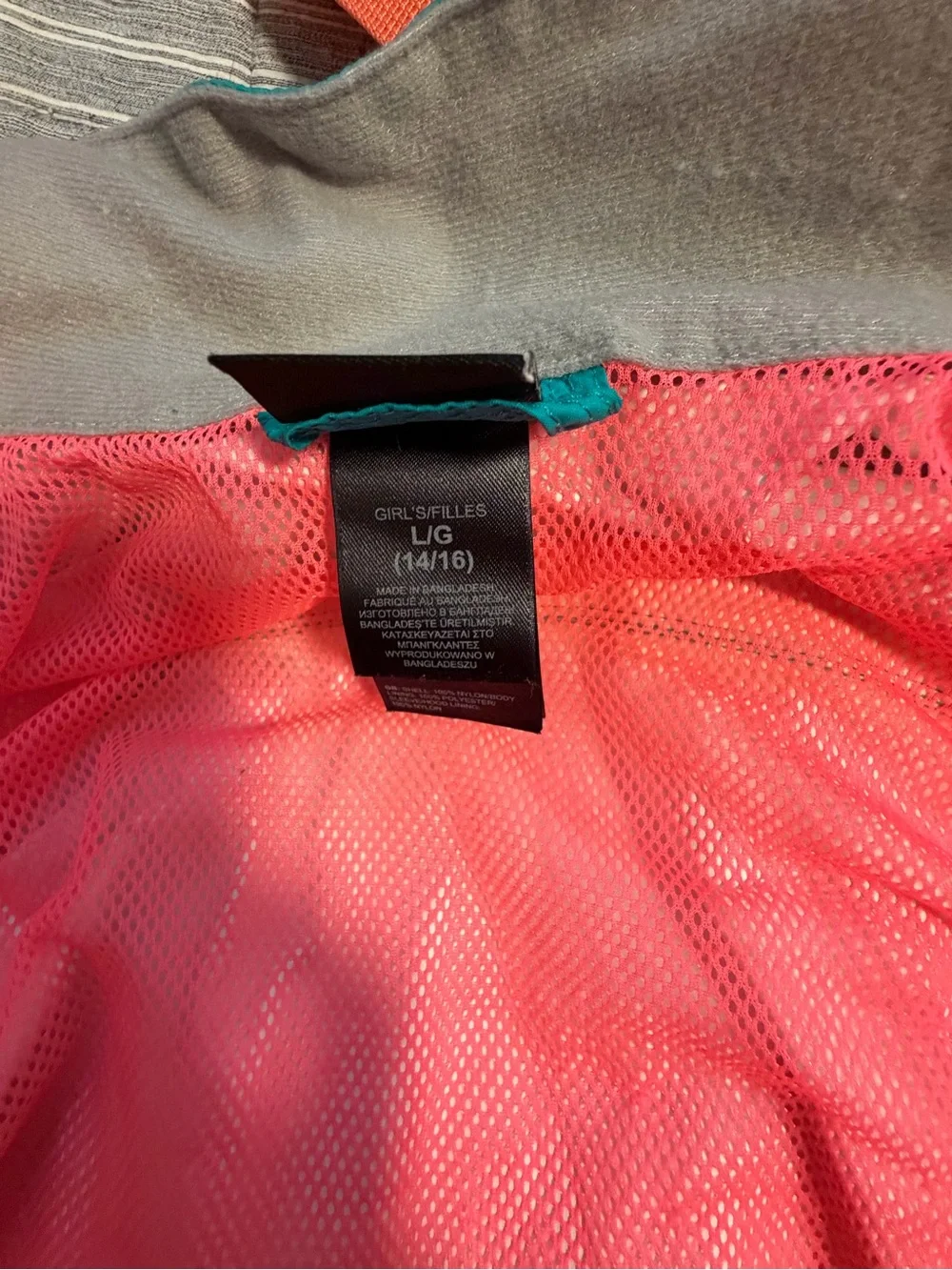 The North Face Turquoise Rain Shell with Pink Trim